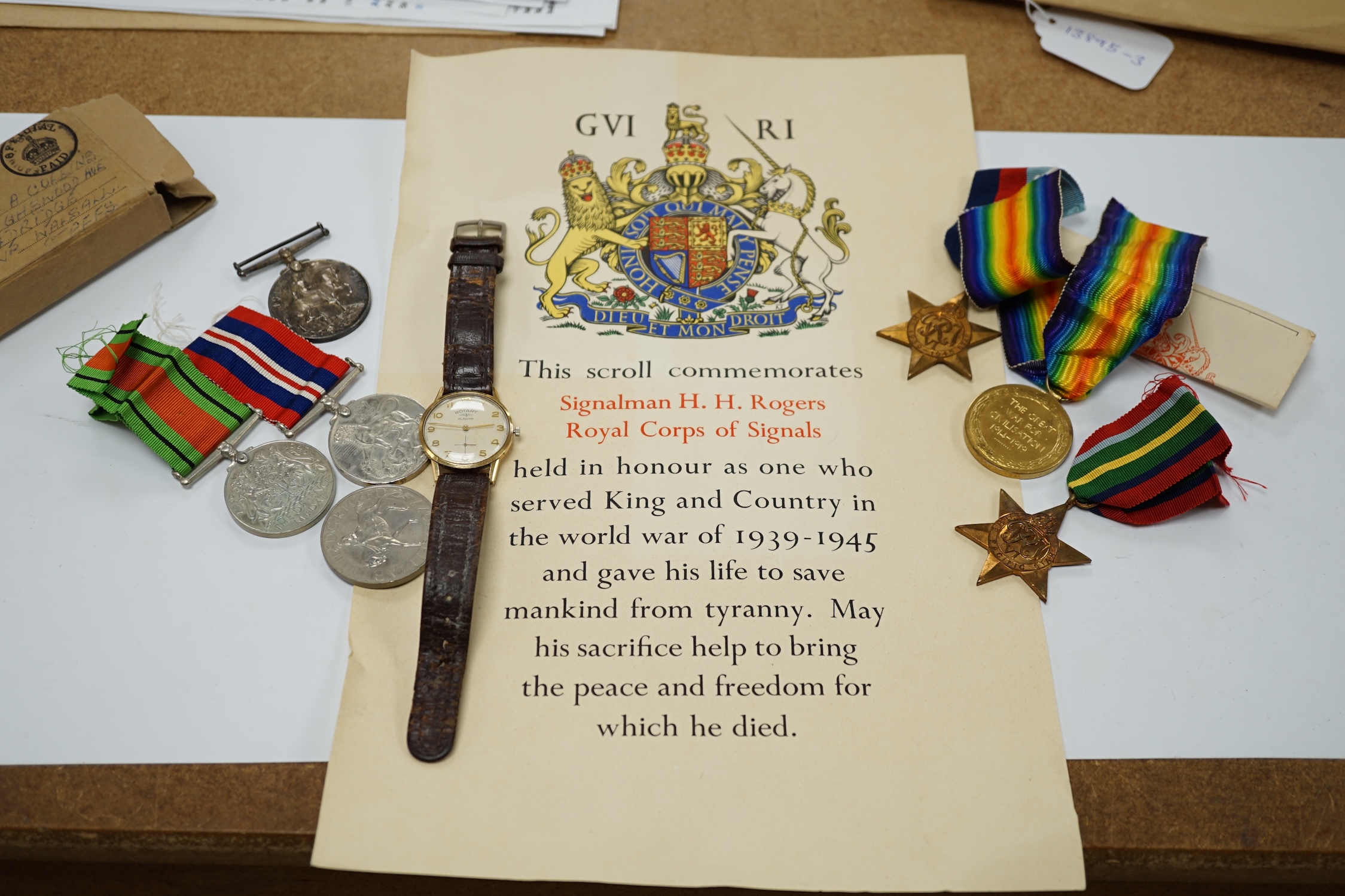 A WWII medal group awarded to Signalman H.H. Rogers, Royal Corps of Signals, comprising; a Pacific Star, a 1939-1945 Star, a Defence Medal and a 1939-1945 War Medal, together with the related note detailing the awards is